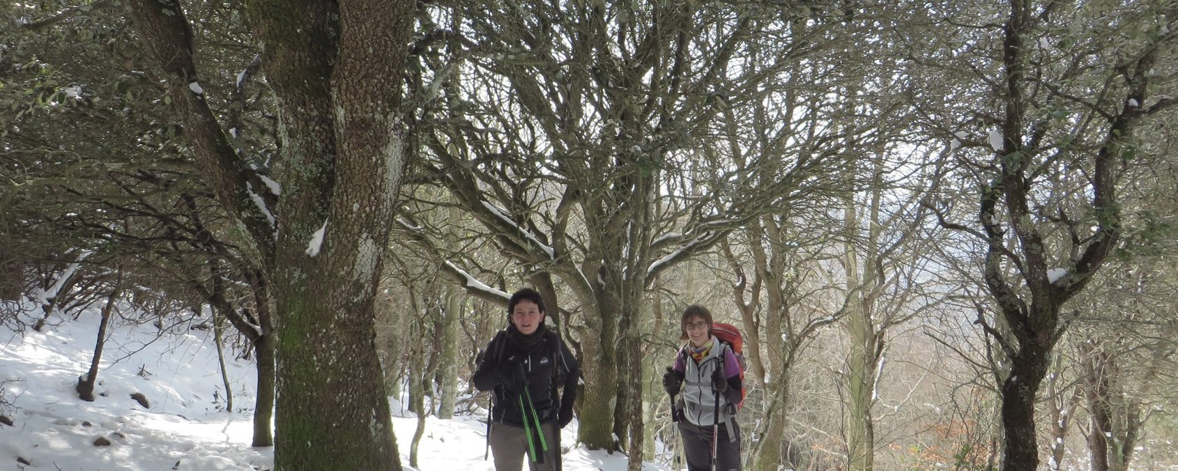 Pilu y Nuri subiendo al Coll del Roure Gros